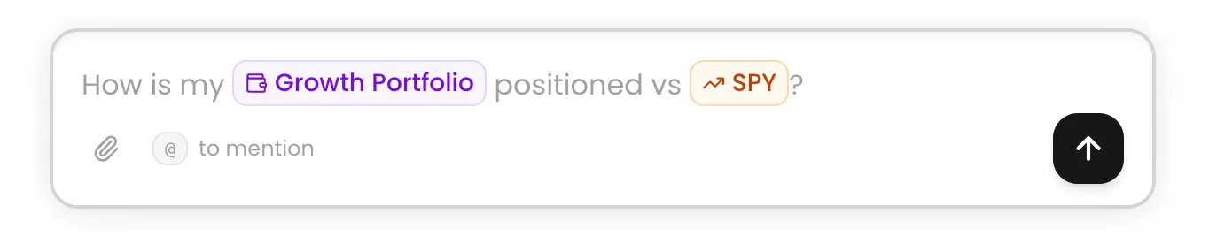 Chat input showing a portfolio context chip and $SPY in a natural language question